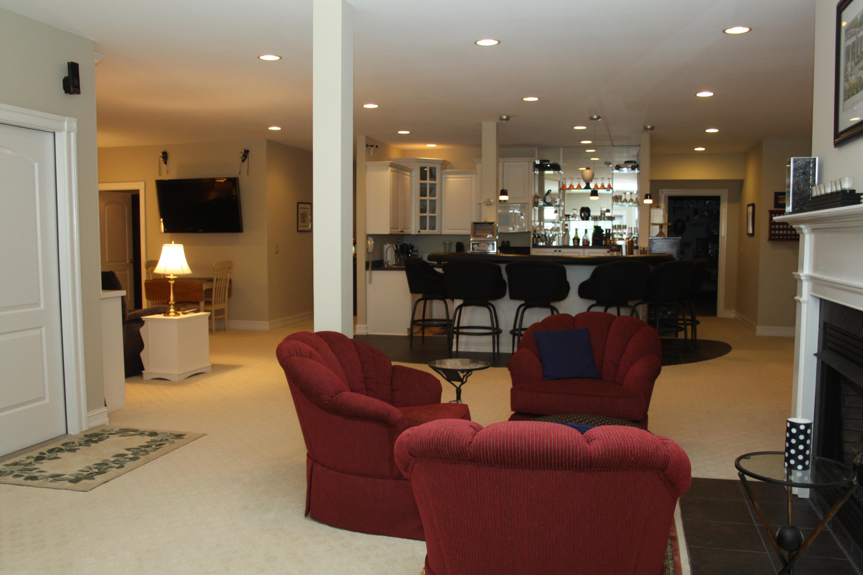 159 Calypso Road Moneta, VA 24121 - Photo 50 of 72 a living room with furniture kitchen view and a chandelier