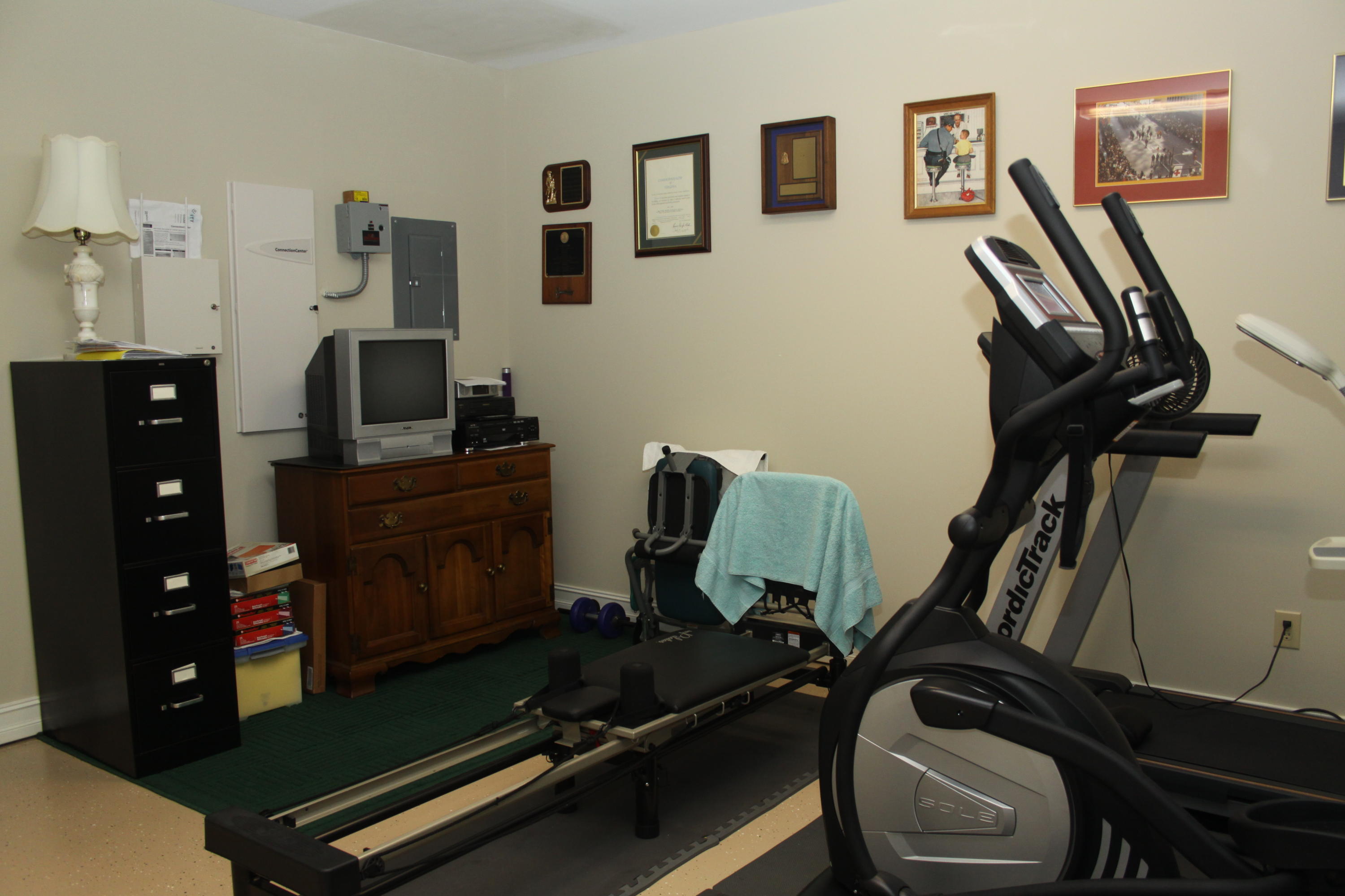 159 Calypso Road Moneta, VA 24121 - Photo 61 of 72 a room with gym equipment and wooden floor