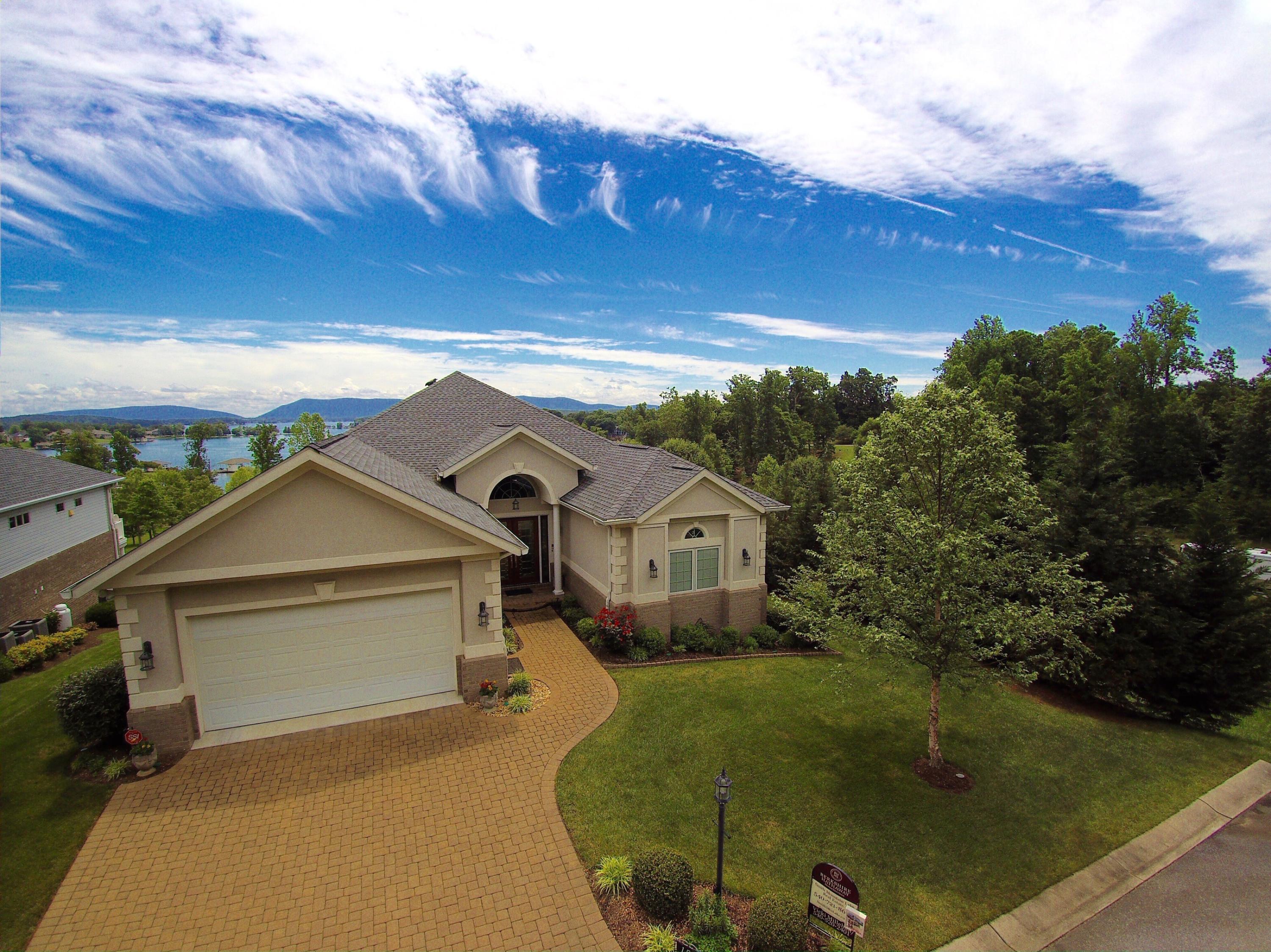 159 Calypso Road Moneta, VA 24121 - Photo 68 of 72 a front view of a house with a yard