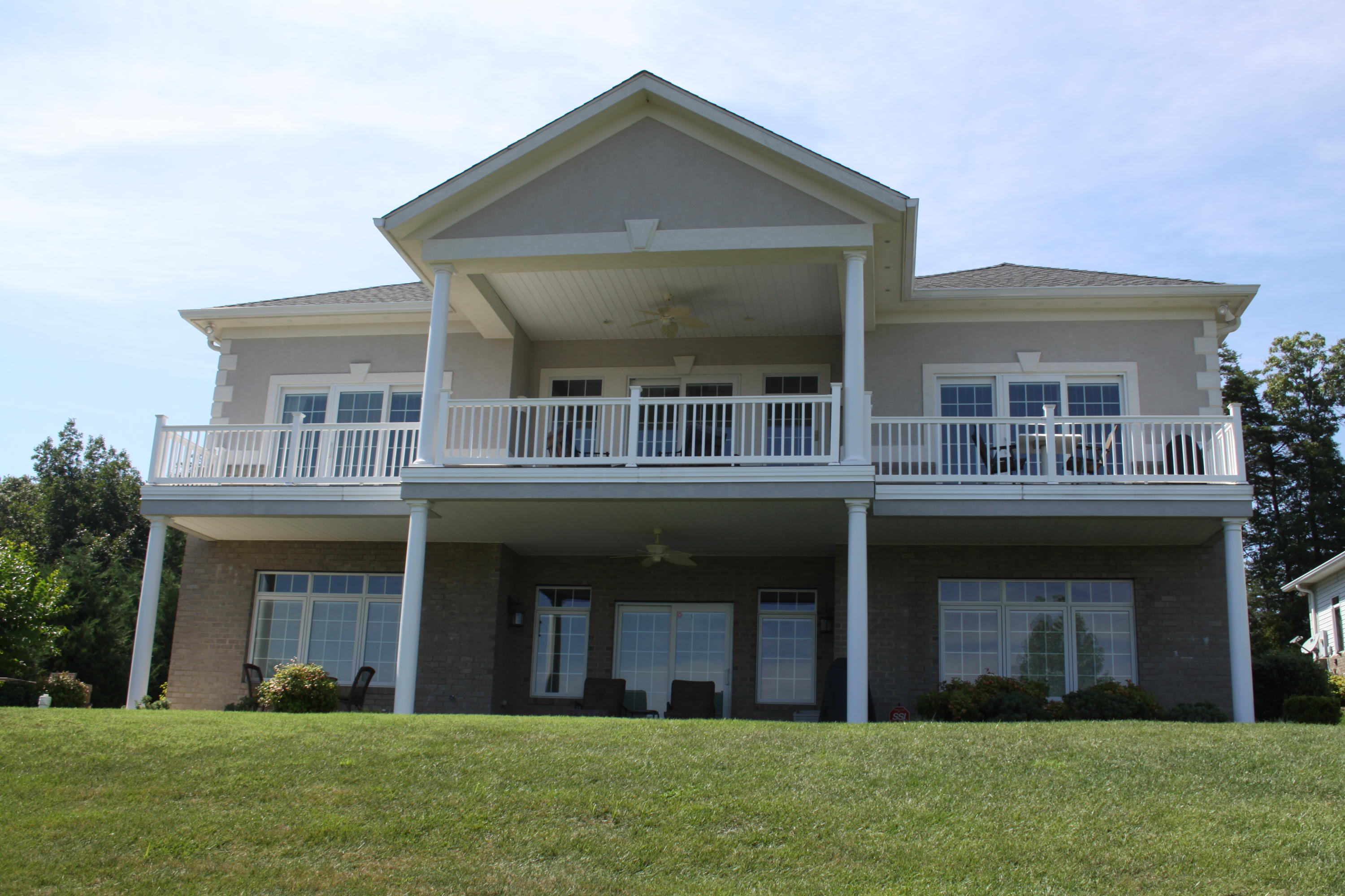 159 Calypso Road Moneta, VA 24121 - Photo 9 of 72 a front view of a house with a yard