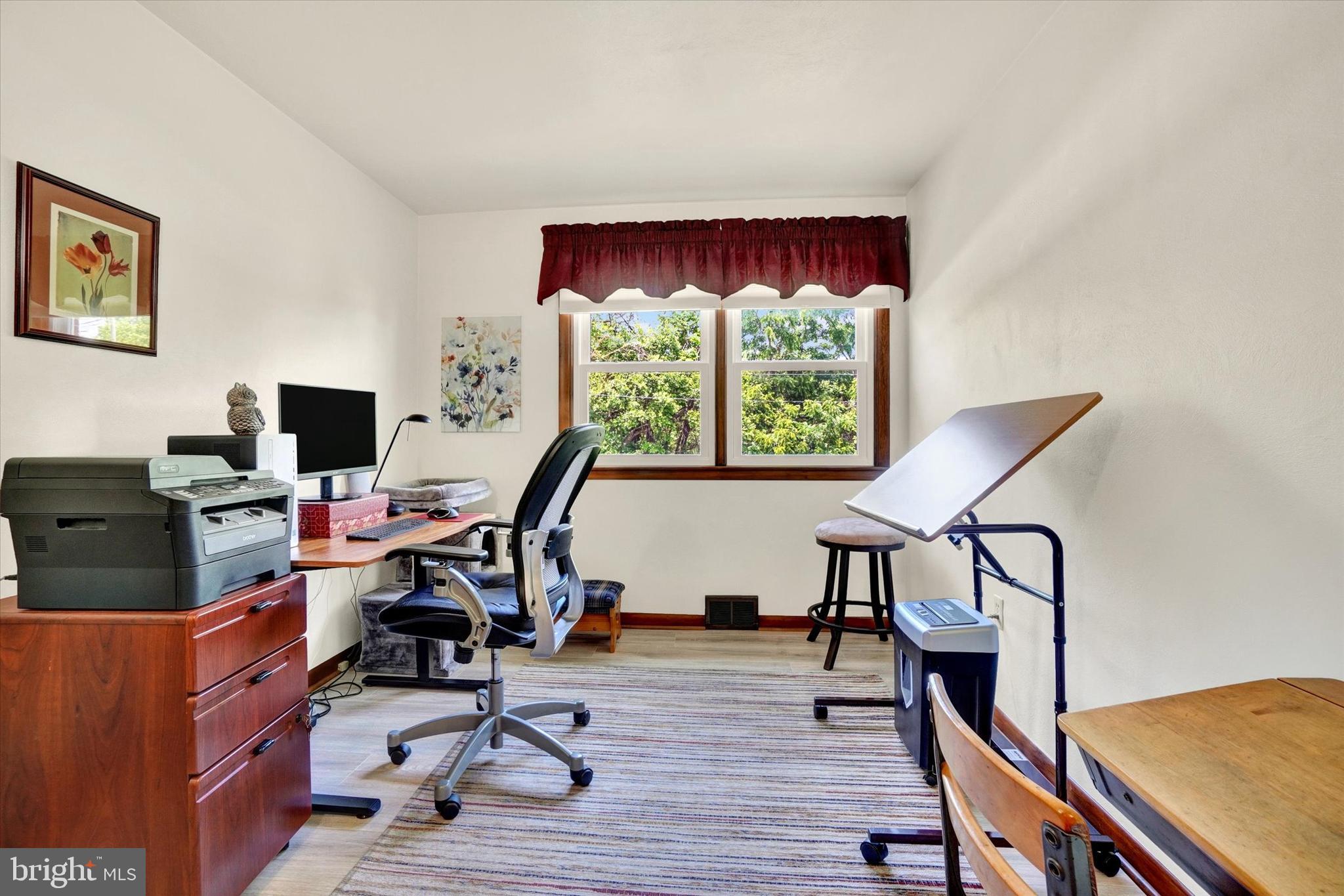 285 South Main Street Mount Wolf, PA 17347 - Photo 24 of 34 a view of a workspace with furniture and a window