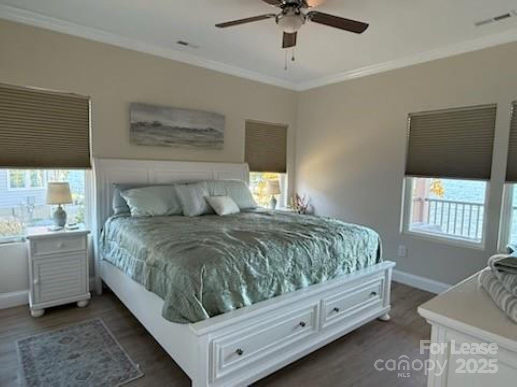 4897 Kiser Island Road, Unit B Terrell, NC 28682 - Photo 6 of 18 a bed sitting in a bedroom next to a window