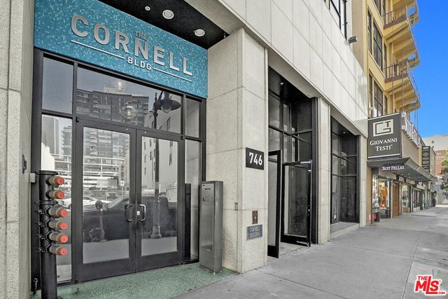 a view of shops in a street