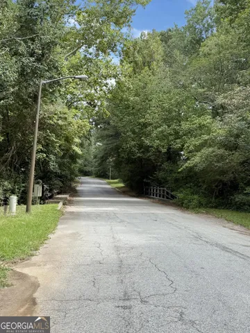a view of backyard with green space