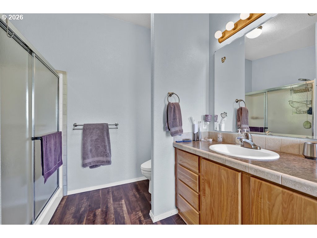 38277 Wheeler Road Dexter, OR 97431 - Photo 23 of 47 a bathroom with a sink and a mirror