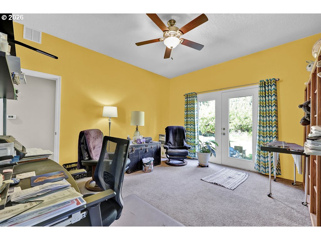 38277 Wheeler Road Dexter, OR 97431 - Photo 24 of 47 a workspace with furniture and a window
