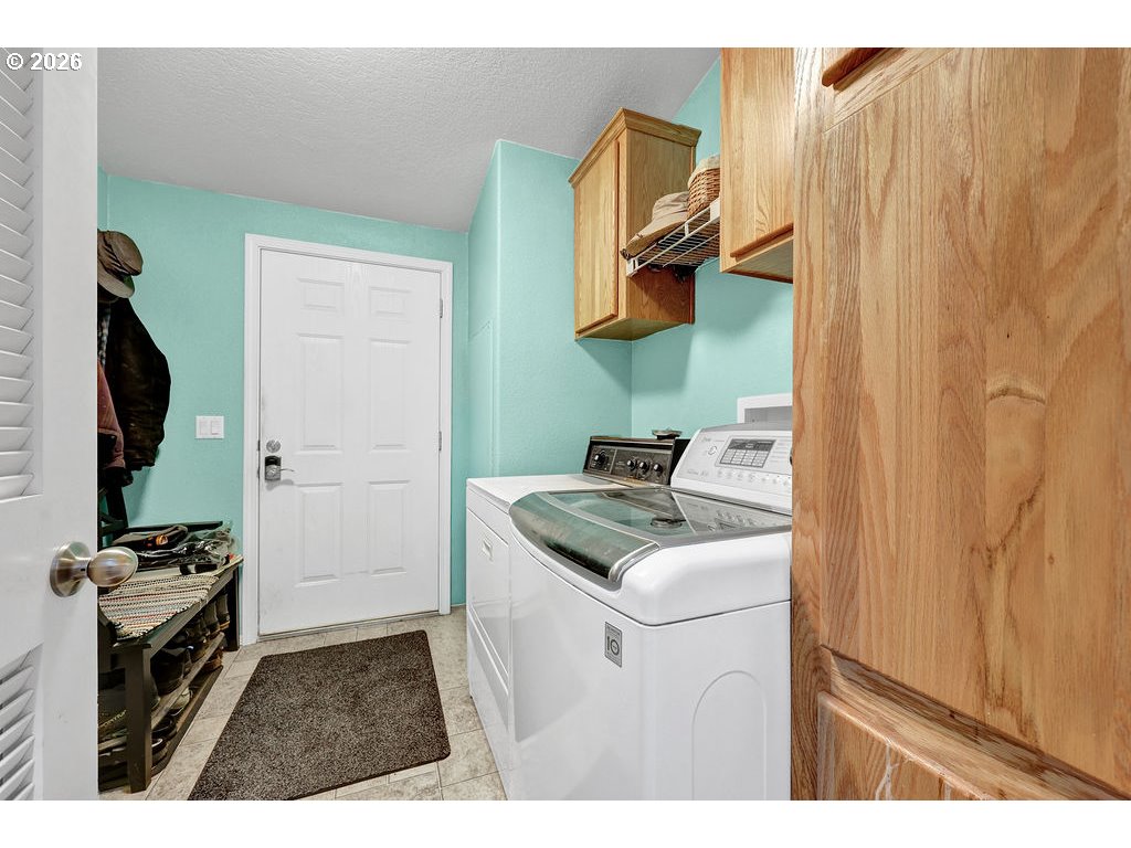 38277 Wheeler Road Dexter, OR 97431 - Photo 29 of 47 a kitchen with a sink and a stove top oven