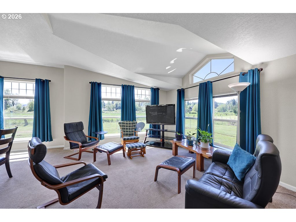 38277 Wheeler Road Dexter, OR 97431 - Photo 5 of 47 a living room with furniture and large windows