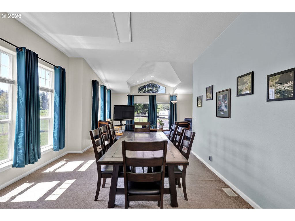 38277 Wheeler Road Dexter, OR 97431 - Photo 8 of 47 a view of a dining room with furniture and window
