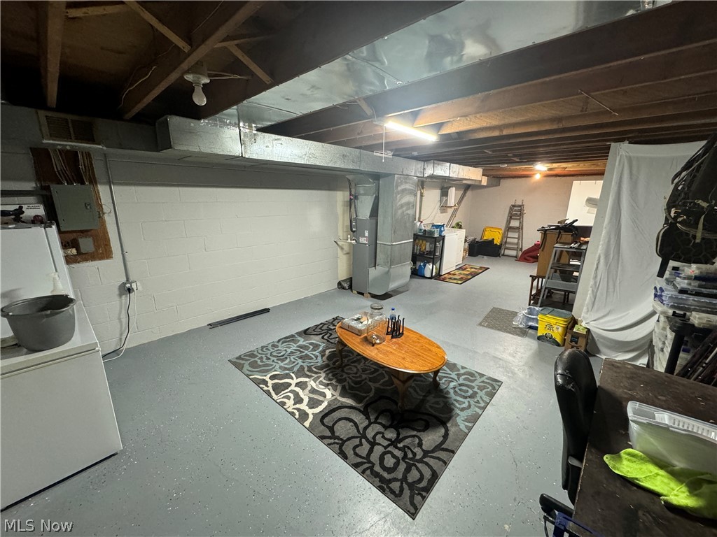5219 D Cline Road Kent, OH 44240 - Photo 12 of 12 Basement featuring utilities and storage space.