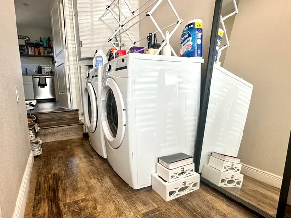 a utility room with dryer and washer