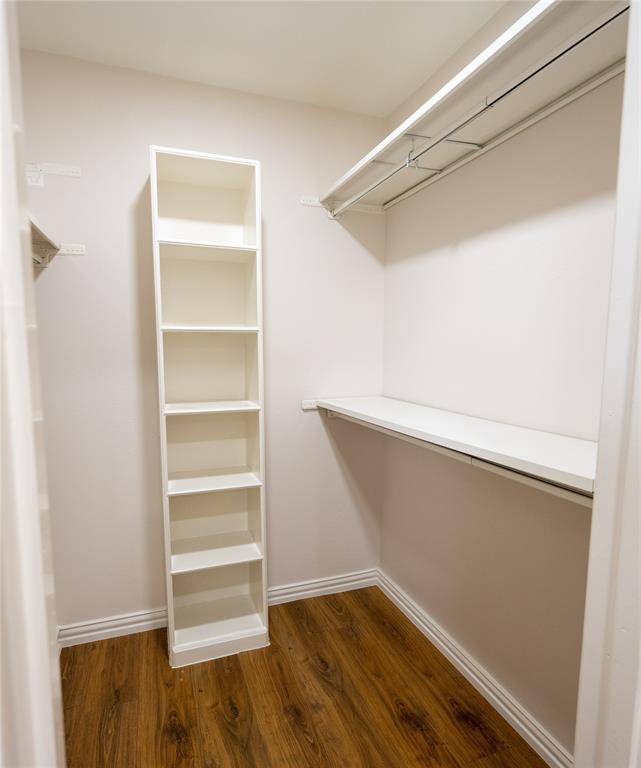 6105 Rincon Way Dallas, TX 75214 - Photo 10 of 11 a view of an empty walk in closet