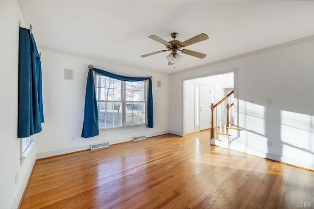 a view of a livingroom with wooden floor