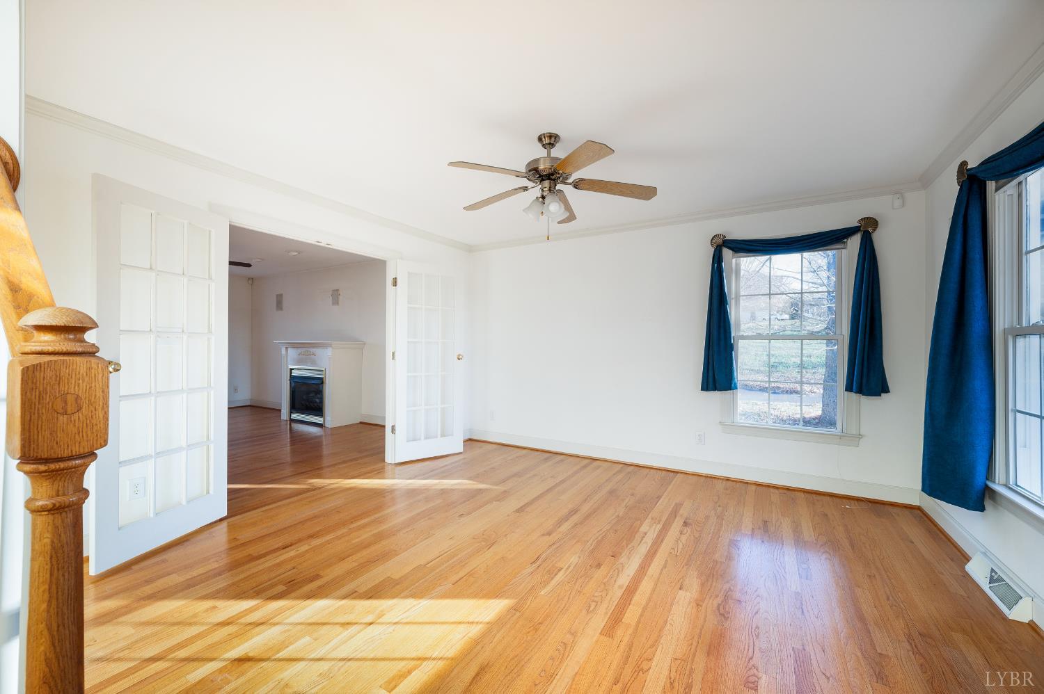 1083 High Grove Lane Forest, VA 24551 - Photo 59 of 75 a view of empty room with wooden floor and fan