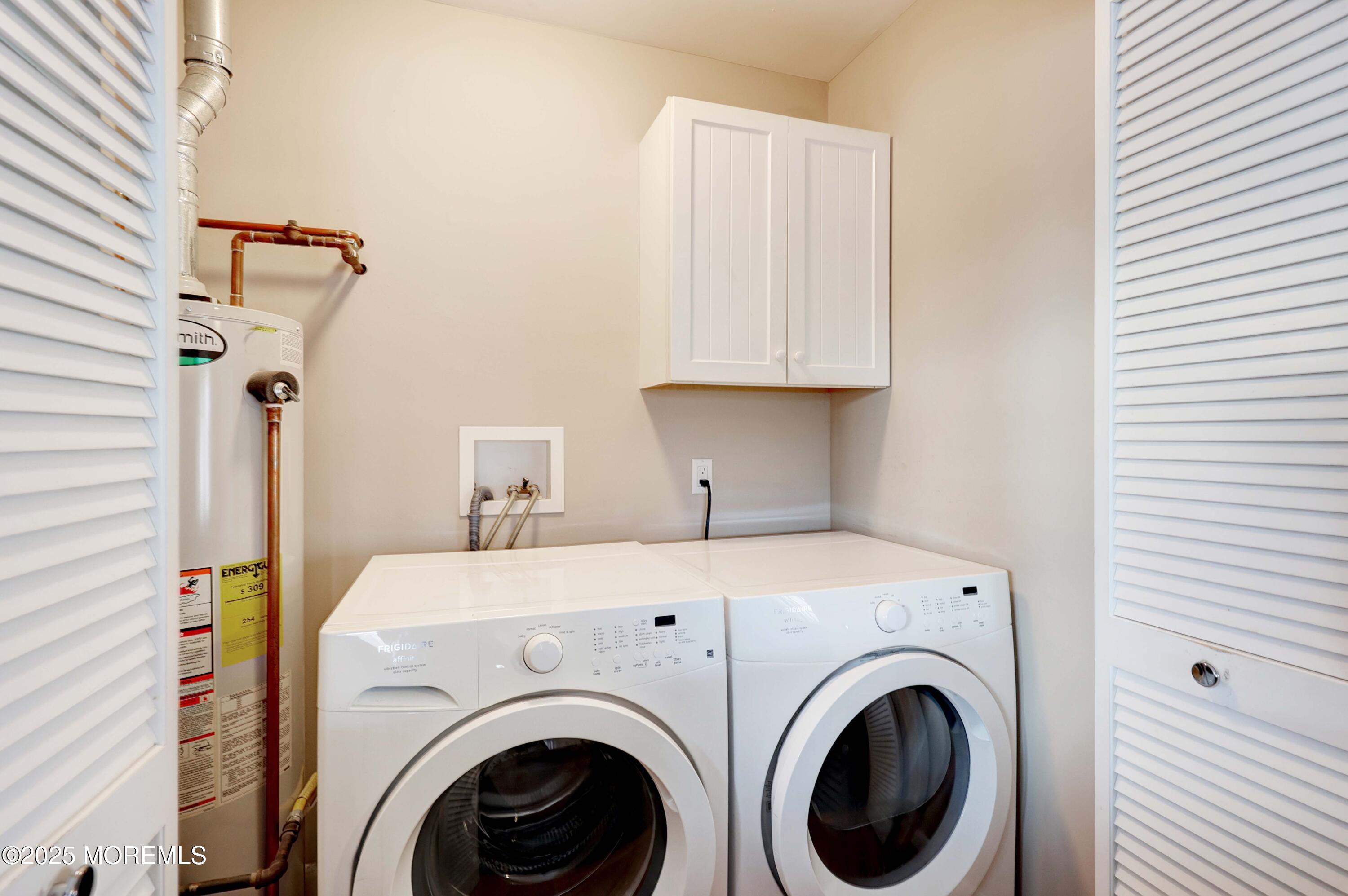 41 Longpoint Drive Brick, NJ 08723 - Photo 15 of 22 a view of entryway with washer and dryer