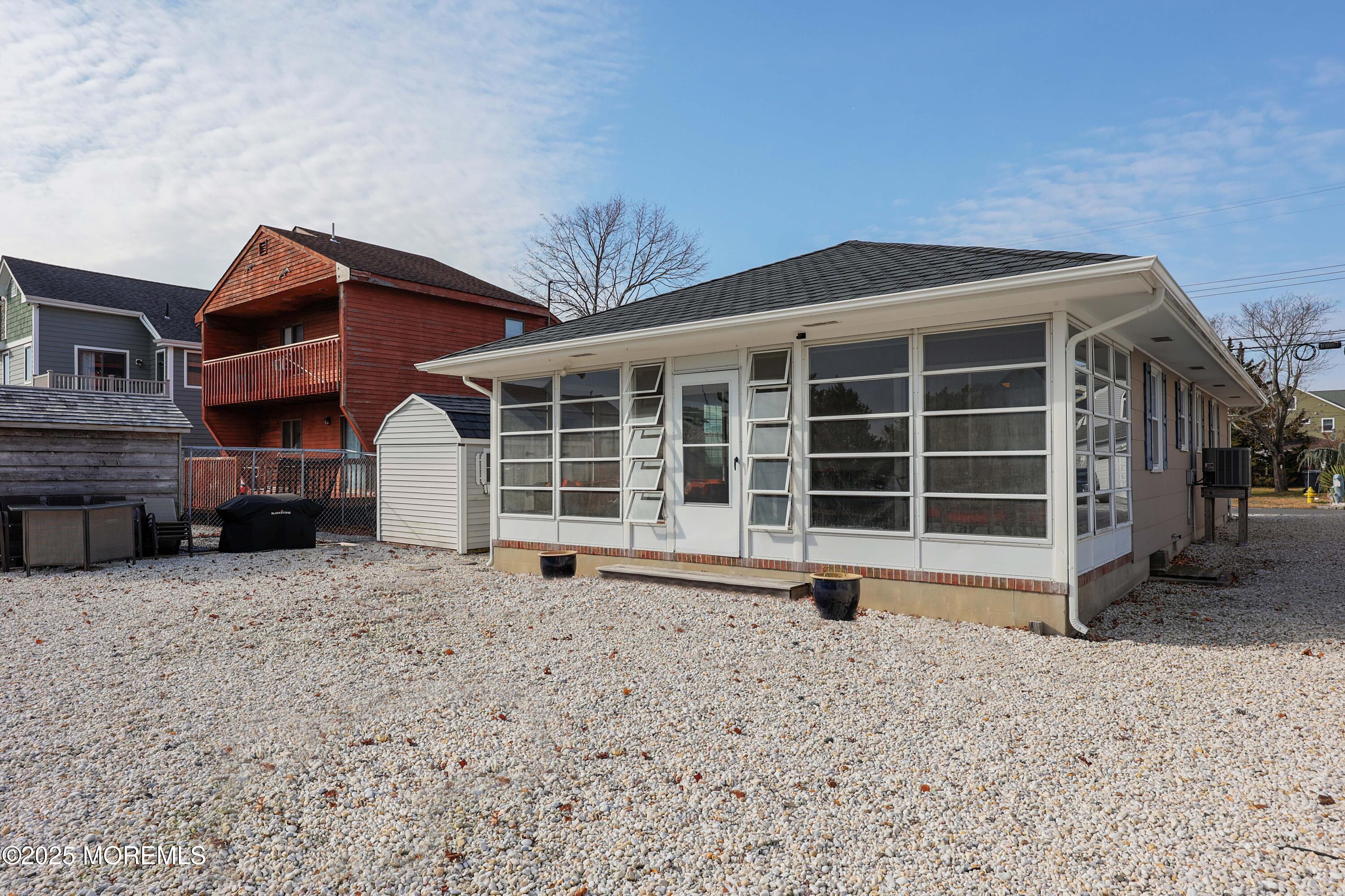 41 Longpoint Drive Brick, NJ 08723 - Photo 18 of 22 a front view of a house with a yard