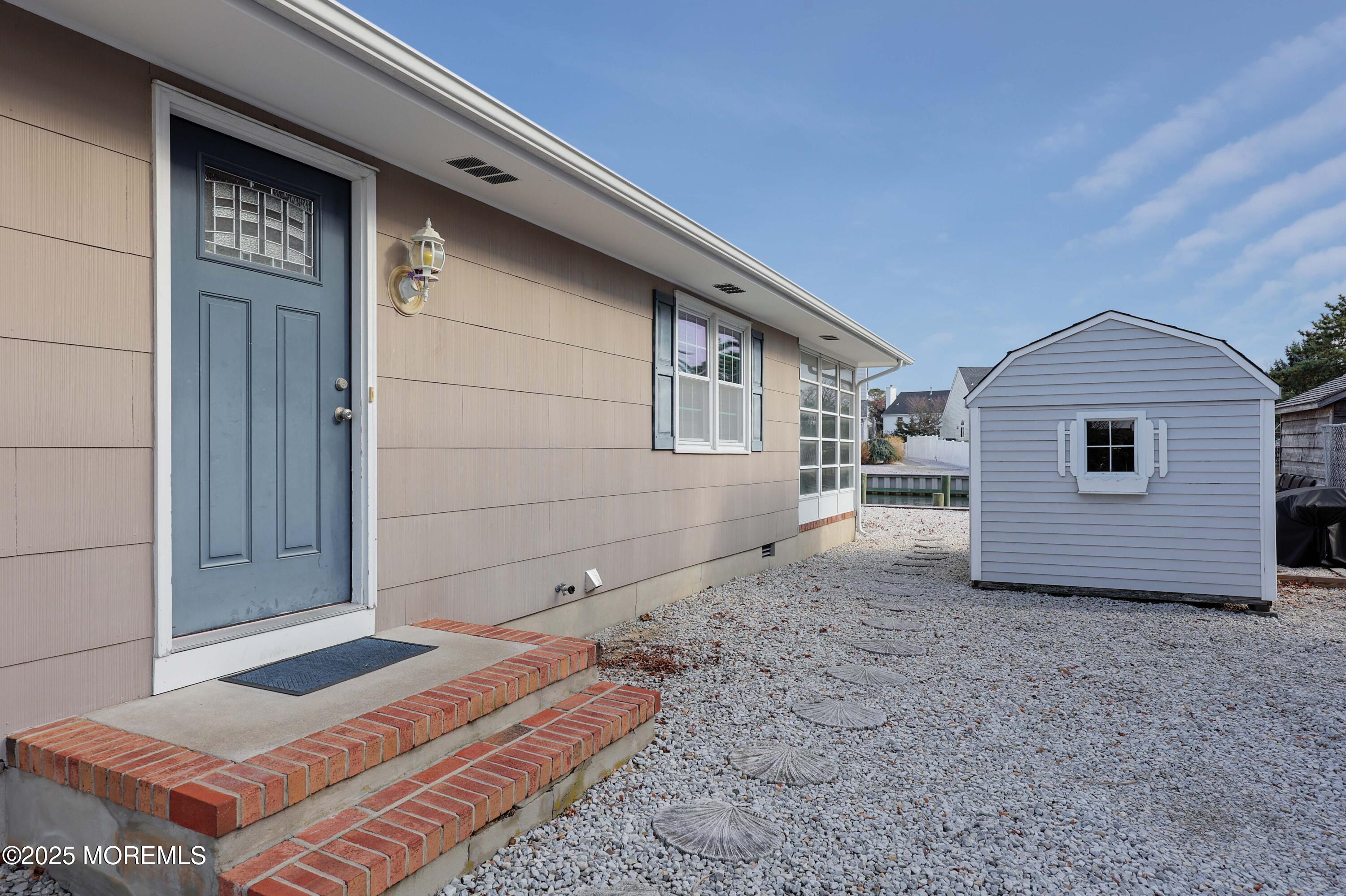 41 Longpoint Drive Brick, NJ 08723 - Photo 21 of 22 a backyard of a house