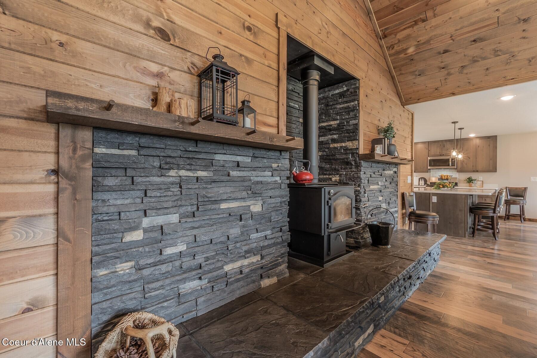 521 Magpie Lane Sandpoint, ID 83864 - Photo 7 of 84 Wood Stove with Stone Hearth