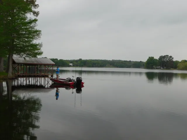 a view of a lake with sitting area