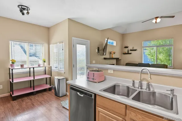 a bathroom with a sink a mirror and a toilet