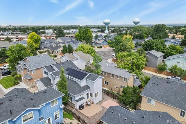 an aerial view of a house with a garden