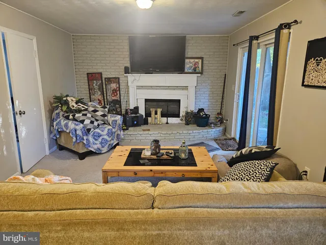 a bathroom with a toilet sink and shower