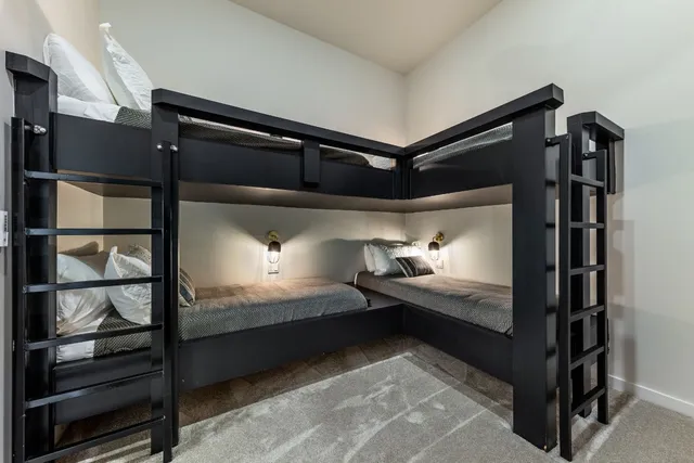 a bedroom with bed and window