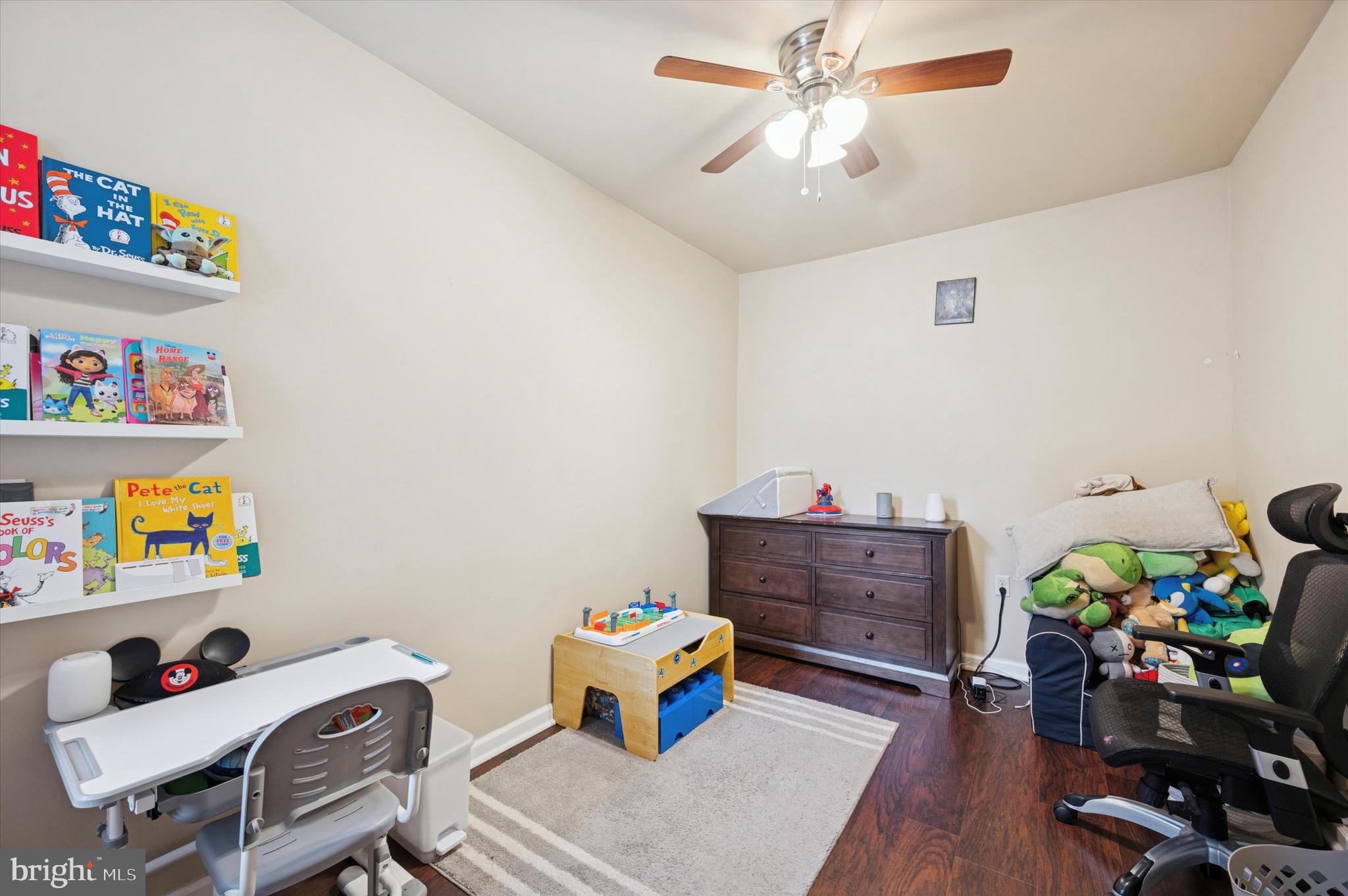 1404 North Felton Street Philadelphia, PA 19151 - Photo 13 of 15 a bedroom with a bed and a wooden floor