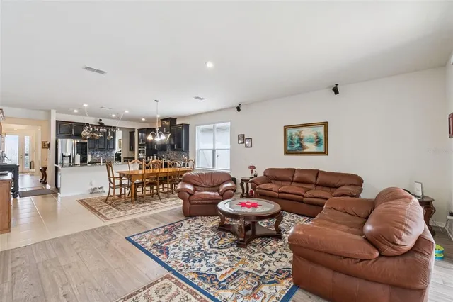 a living room with furniture or couch and a coffee table