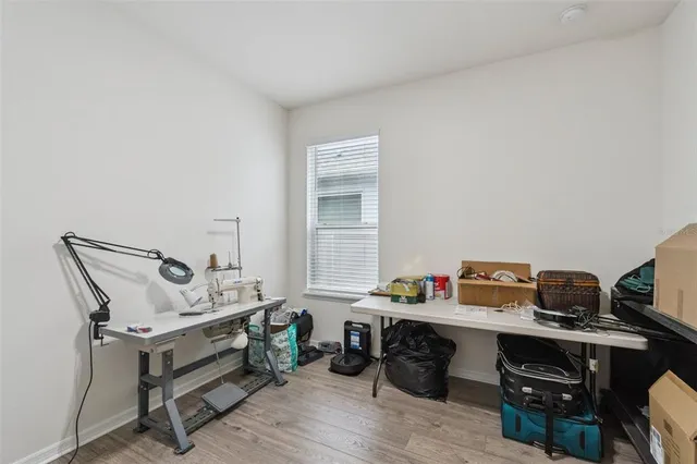 a bed room with a bed and a window