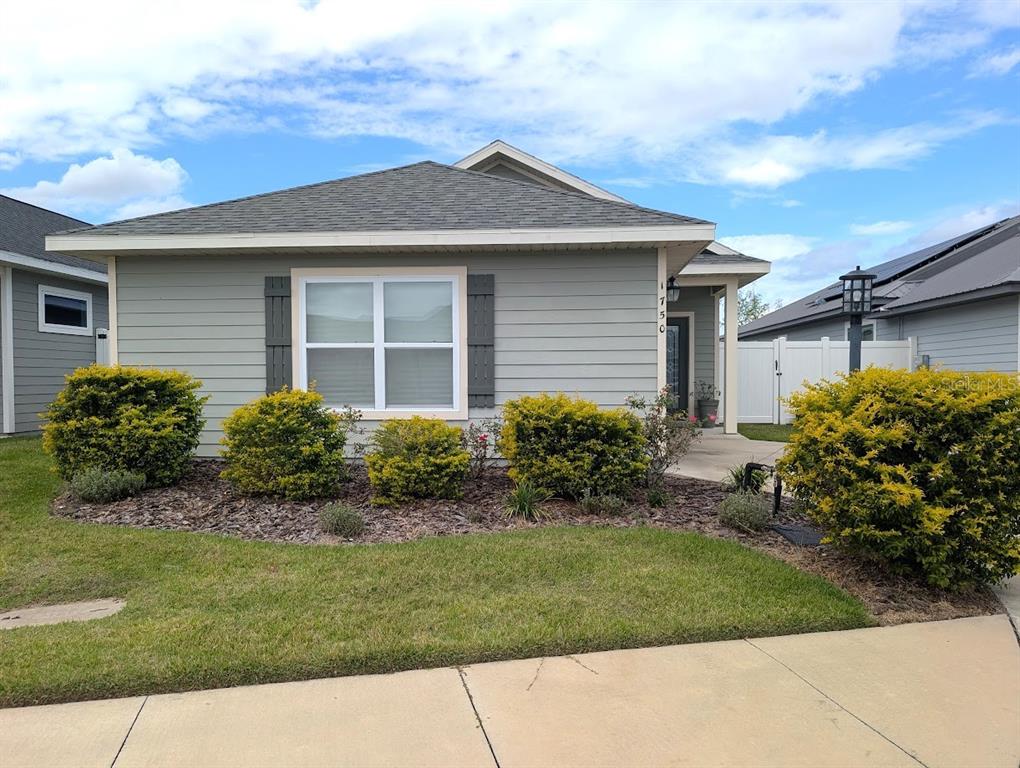 1750 Southwest 246th Drive Newberry, FL 32669 - Photo 18 of 18 a house that is sitting in the grass