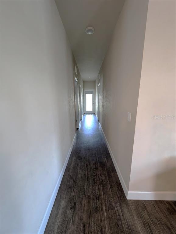 1750 Southwest 246th Drive Newberry, FL 32669 - Photo 9 of 18 a view of gallery with wooden floor