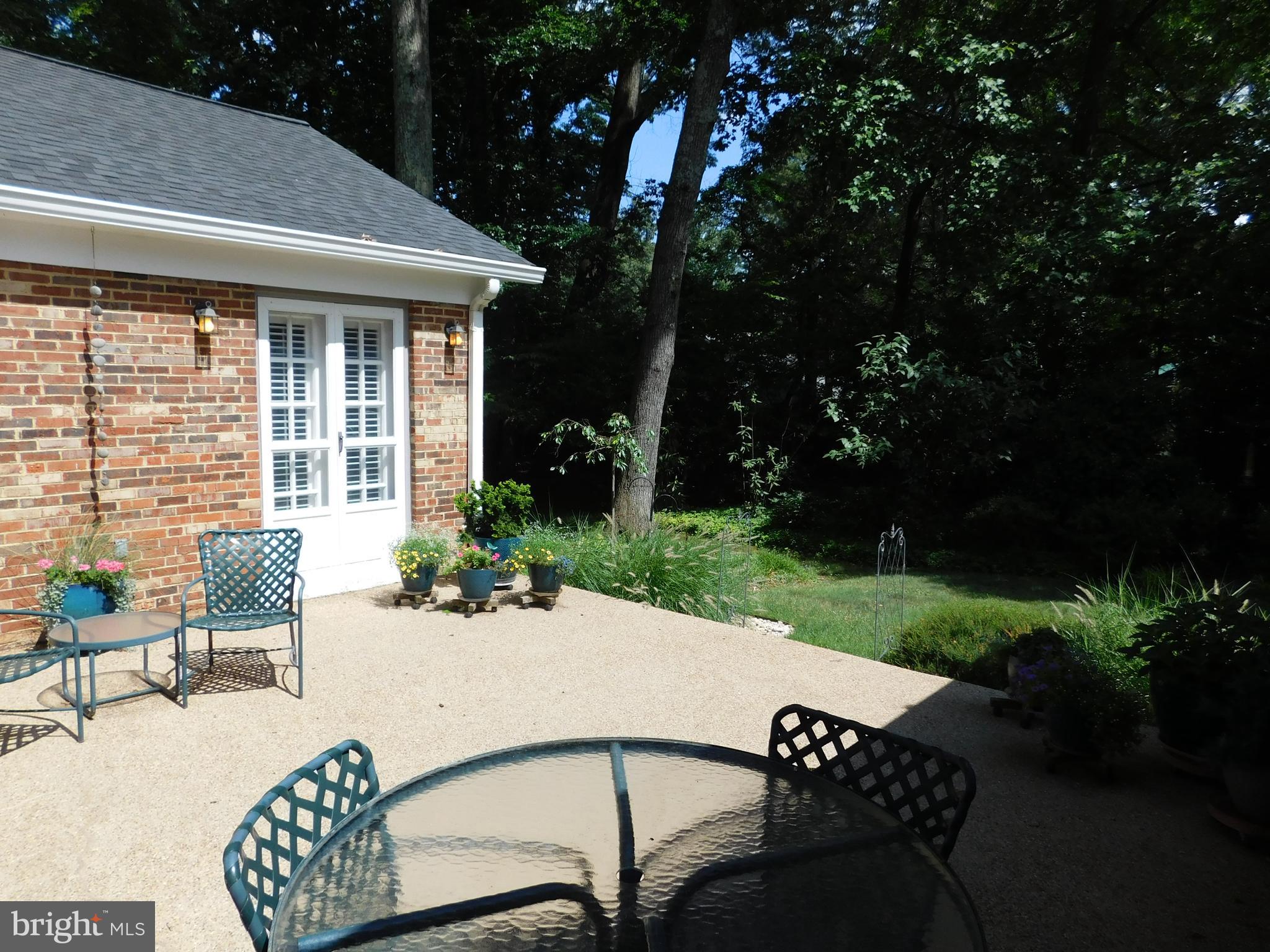 12123 Stirrup Road Reston, VA 20191 - Photo 41 of 53 The primary bedroom also opens to the patio.