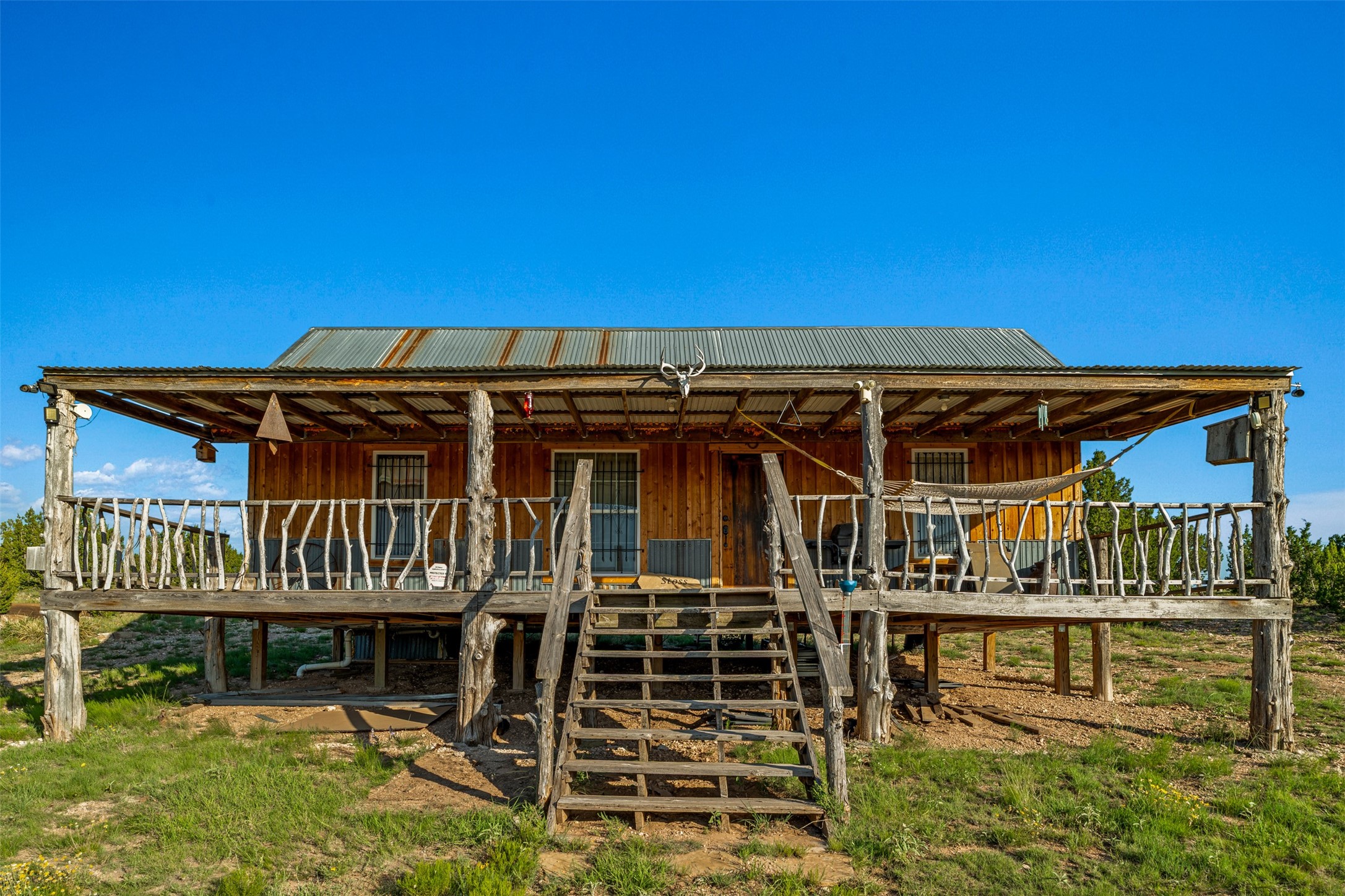 4221 Palo Amarillo Road Santa Rosa, NM 88435 - Photo 2 of 78 CABIN FRONT