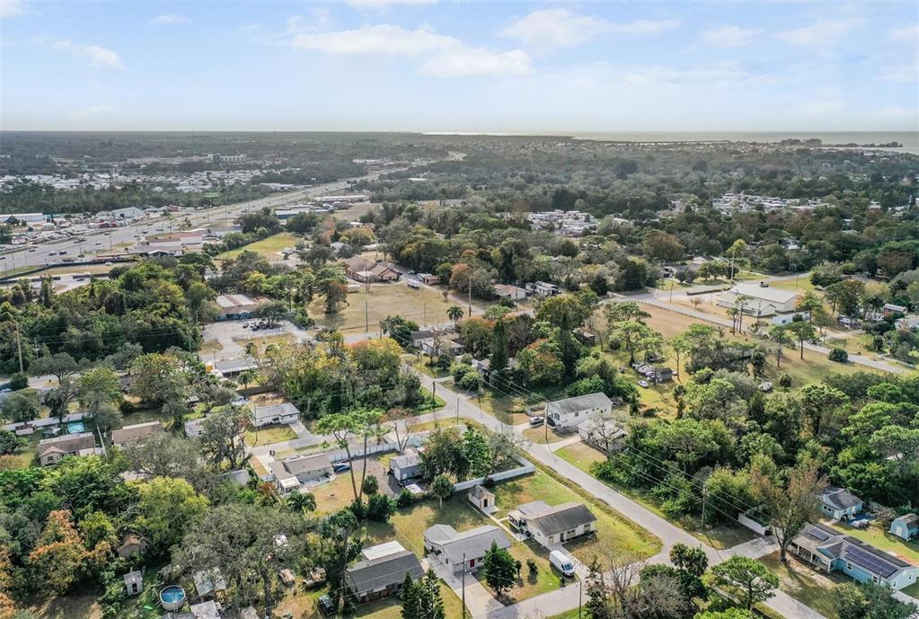7802 Butler Avenue Hudson, FL 34667 - Photo 21 of 30 an aerial view of residential houses with outdoor space