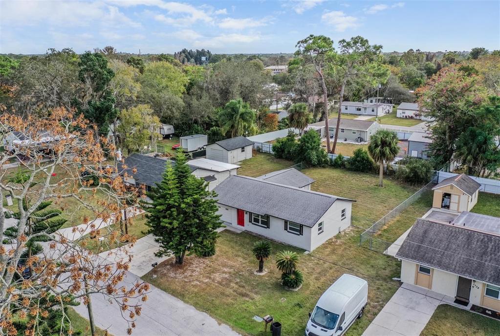 7802 Butler Avenue Hudson, FL 34667 - Photo 25 of 30 an aerial view of a house with a garden