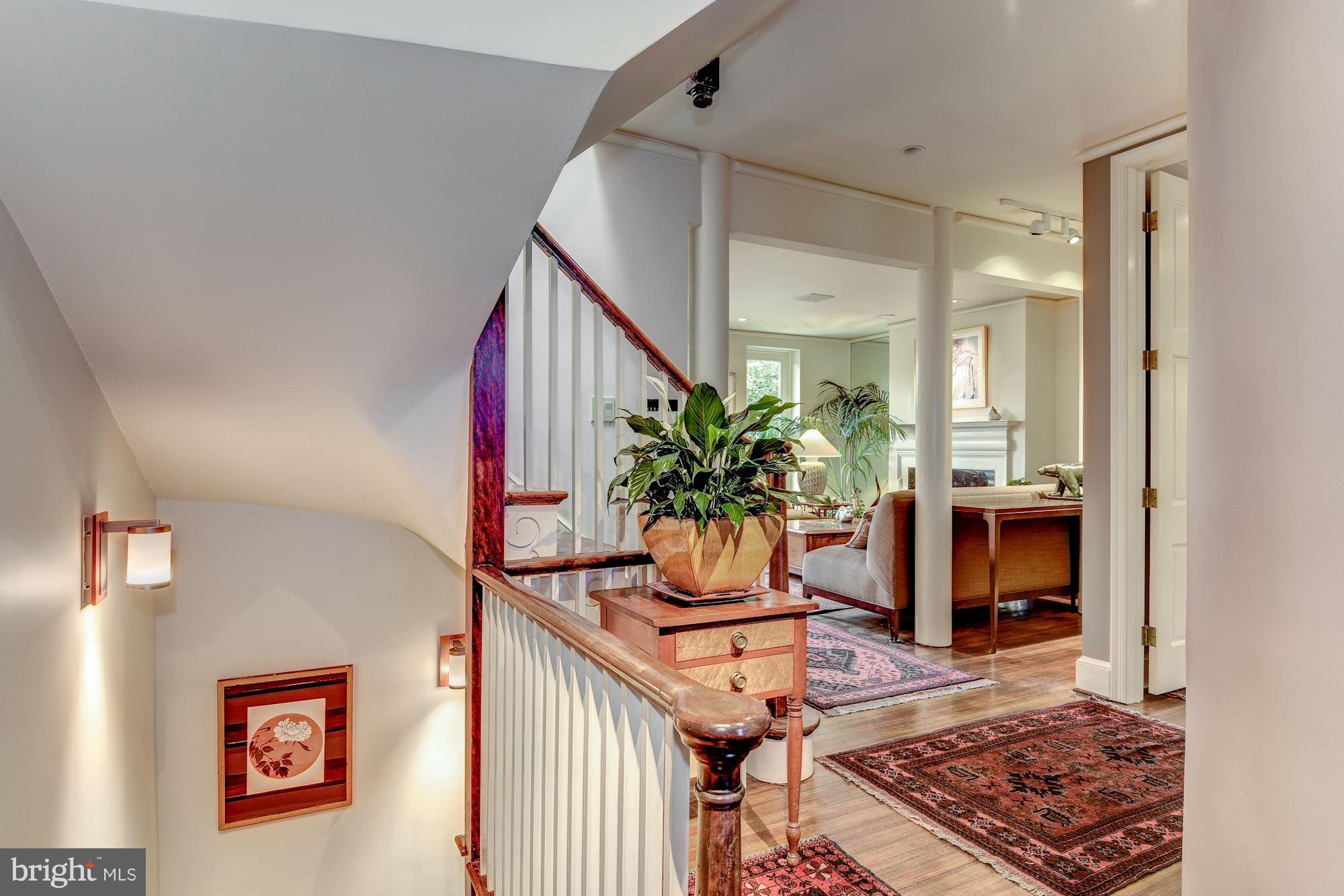 1610 32nd Street Northwest Washington, DC 20007 - Photo 2 of 27 a very nice looking room with a red couch