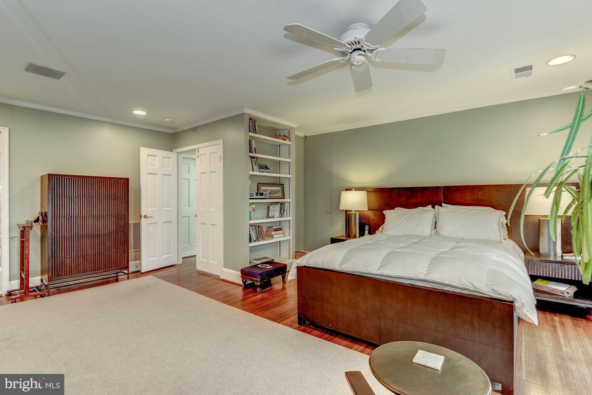 1610 32nd Street Northwest Washington, DC 20007 - Photo 12 of 27 a bedroom with a bed dresser and a window