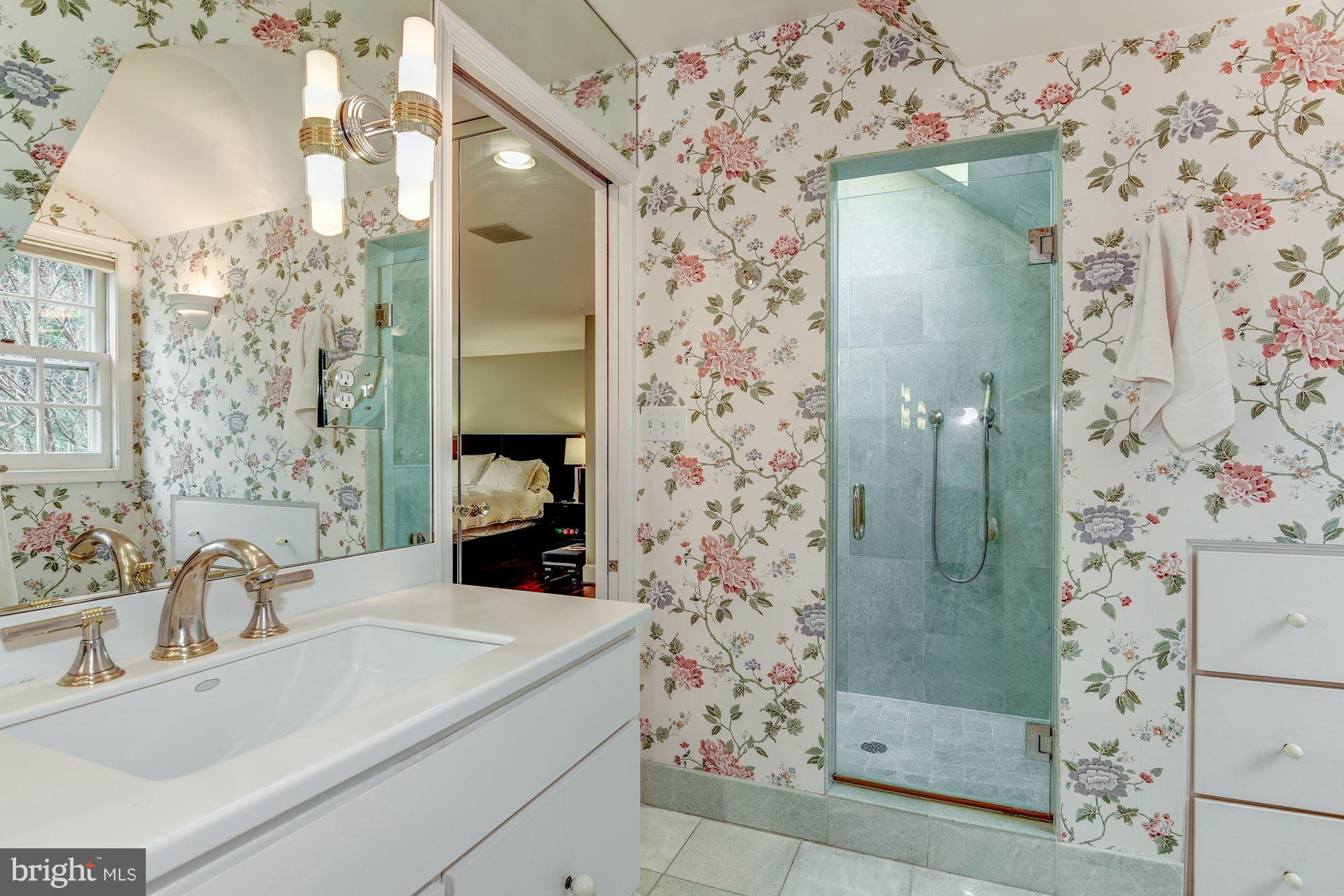 1610 32nd Street Northwest Washington, DC 20007 - Photo 13 of 27 a bathroom with a sink and a mirror