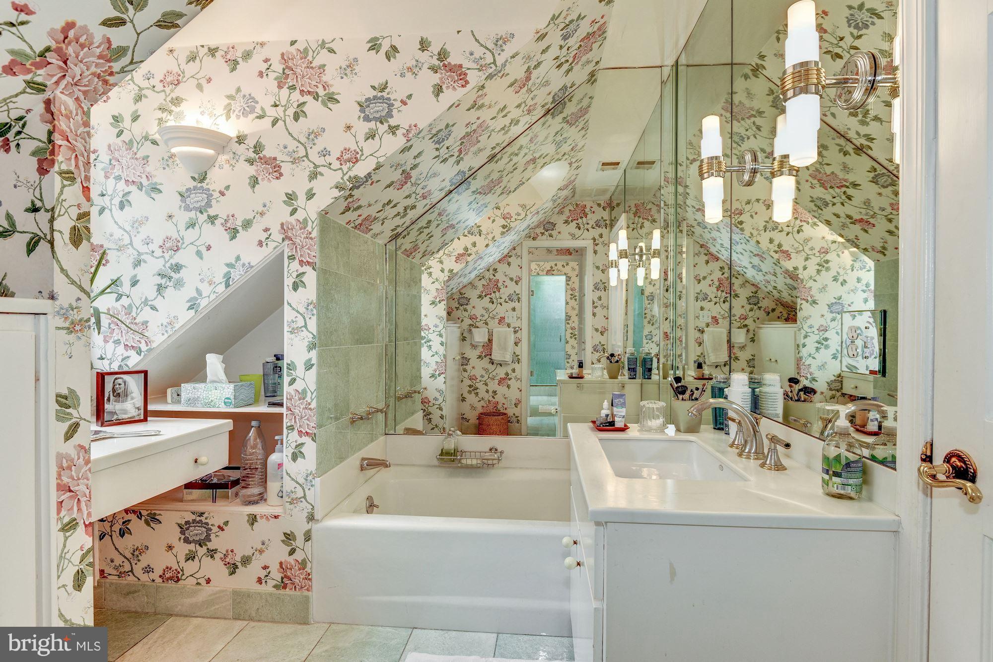 1610 32nd Street Northwest Washington, DC 20007 - Photo 14 of 27 a bathroom with a sink and a mirror