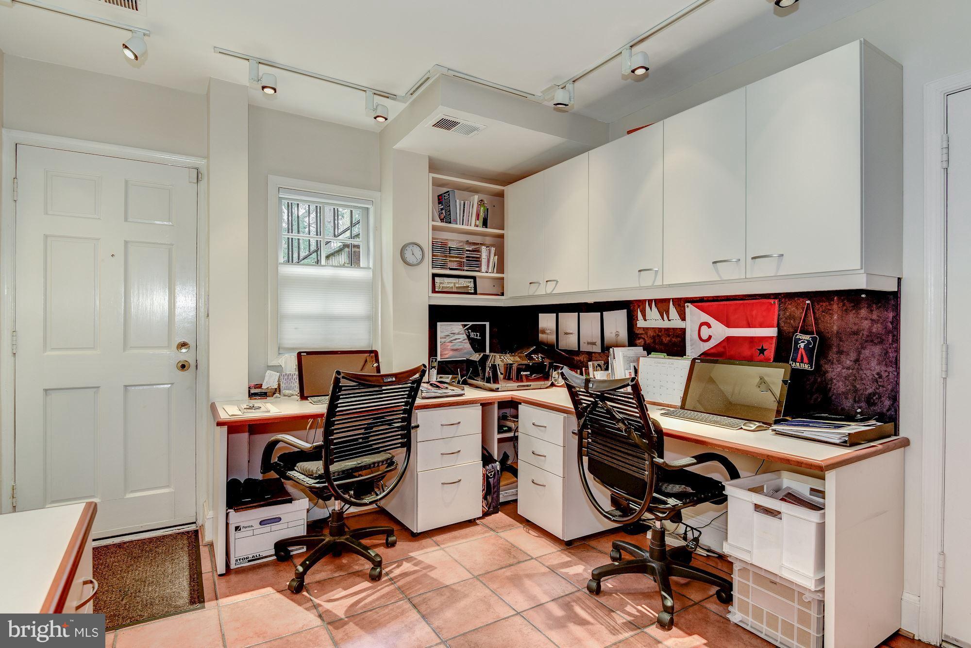 1610 32nd Street Northwest Washington, DC 20007 - Photo 15 of 27 a view of a workspace with furniture