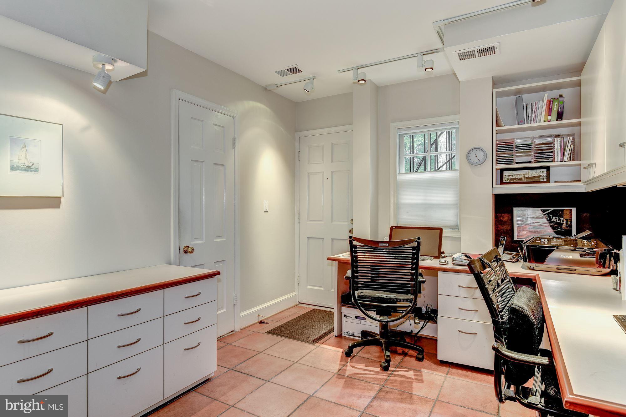 1610 32nd Street Northwest Washington, DC 20007 - Photo 16 of 27 a view of a workspace with furniture