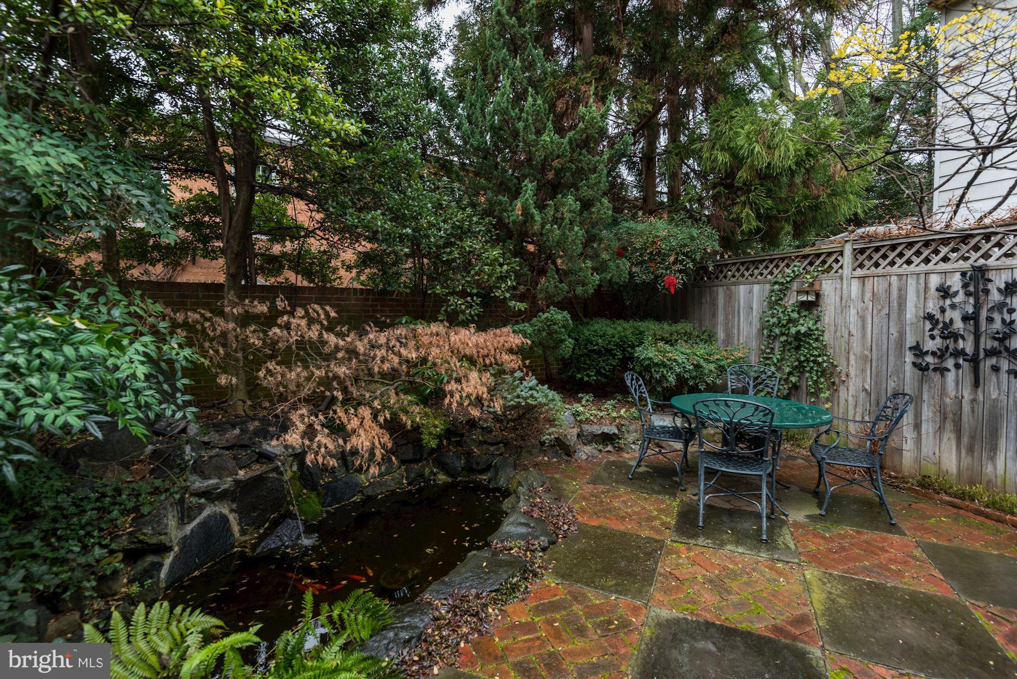 1610 32nd Street Northwest Washington, DC 20007 - Photo 23 of 27 a view of a backyard with sitting area