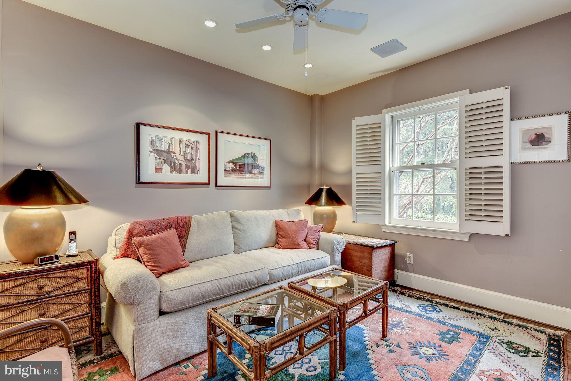 1610 32nd Street Northwest Washington, DC 20007 - Photo 8 of 27 a living room with furniture and a window