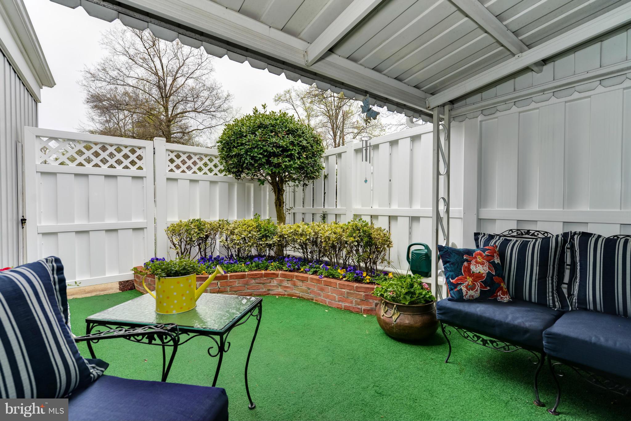 3668 Edelmar Terrace, Unit 118B Silver Spring, MD 20906 - Photo 19 of 27 Exterior (Rear) Patio from Dining Room