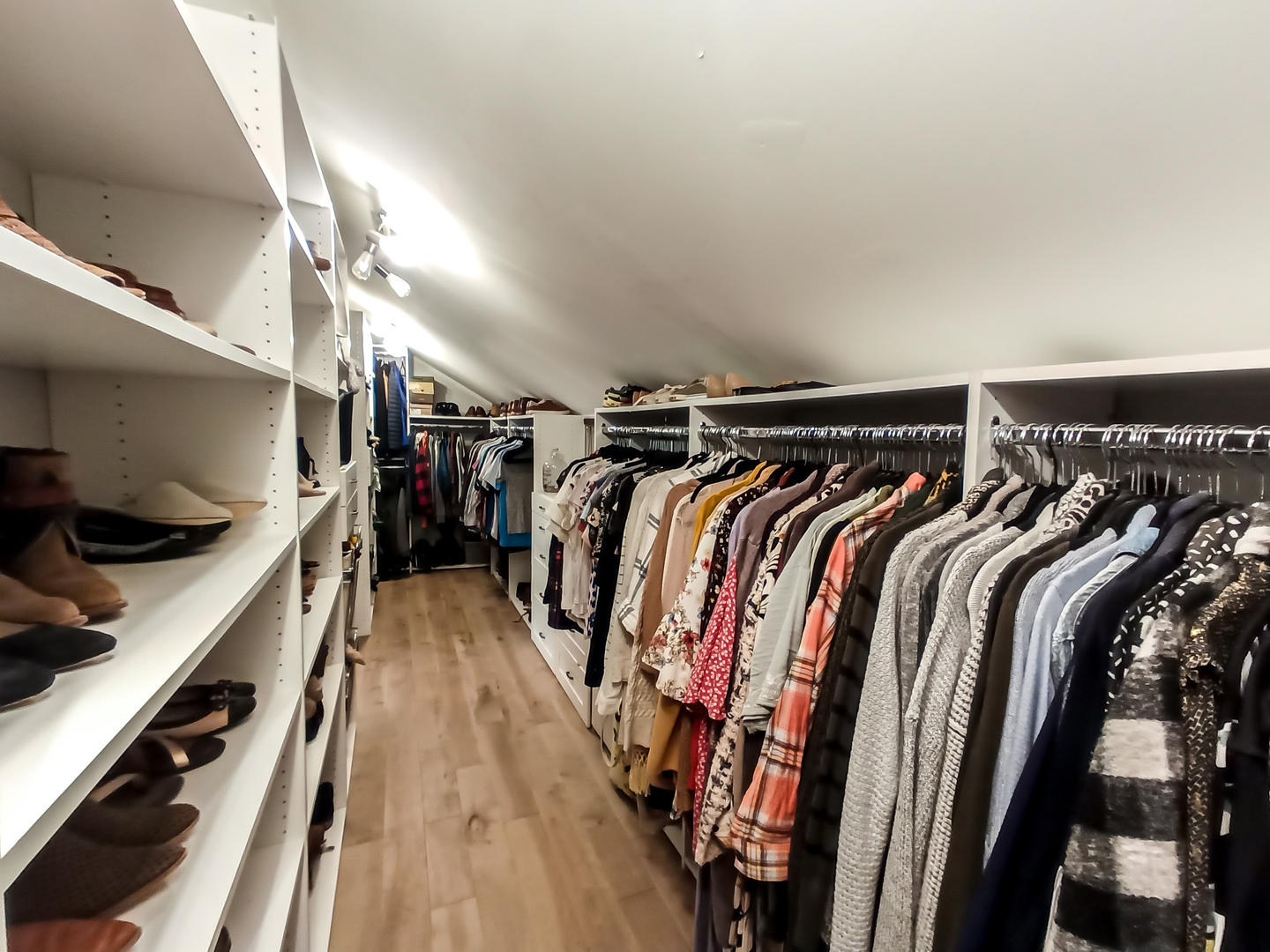2771 East 1779th Road Ottawa, IL 61350 - Photo 19 of 36 a view of walk in closet with clothes and shoes