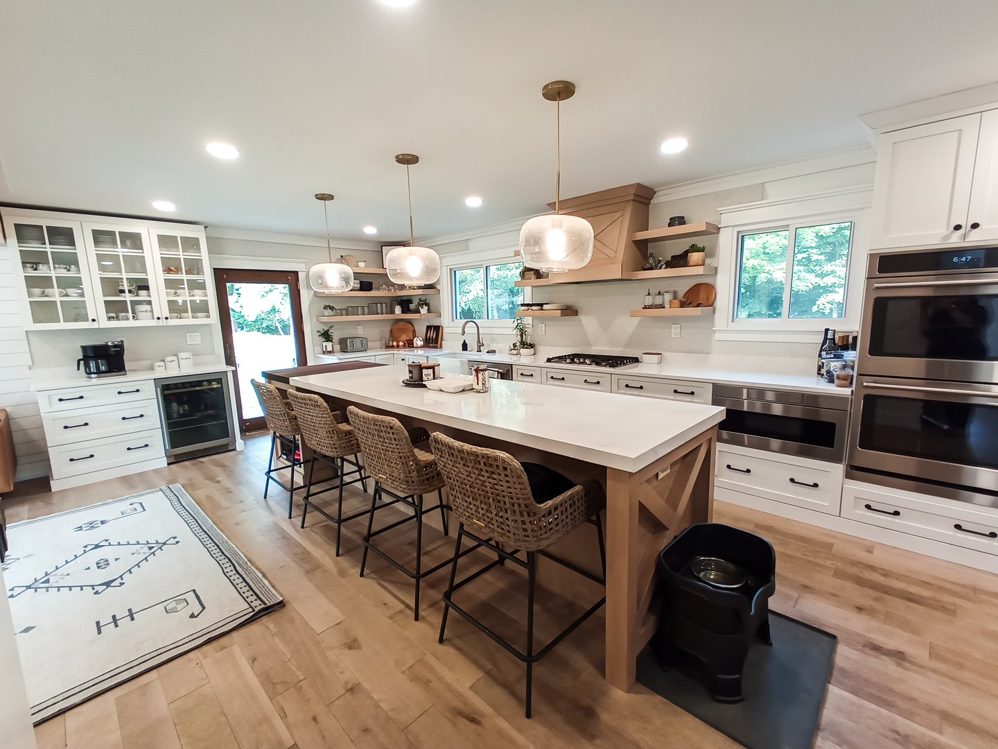 2771 East 1779th Road Ottawa, IL 61350 - Photo 5 of 36 a kitchen with a stove a refrigerator and a dining table with wooden floor