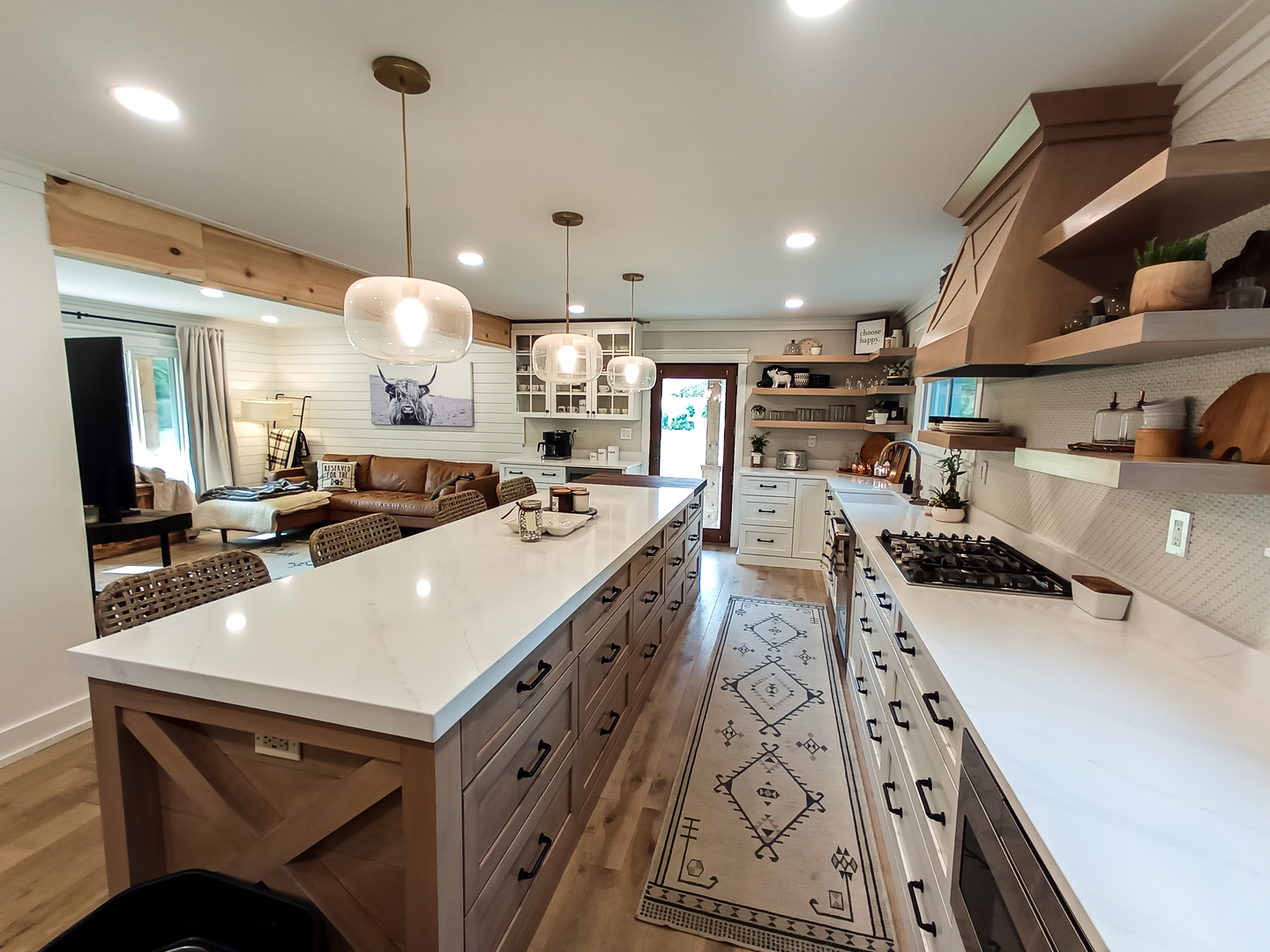2771 East 1779th Road Ottawa, IL 61350 - Photo 6 of 36 a large kitchen with kitchen island a stove a sink a center island and couches