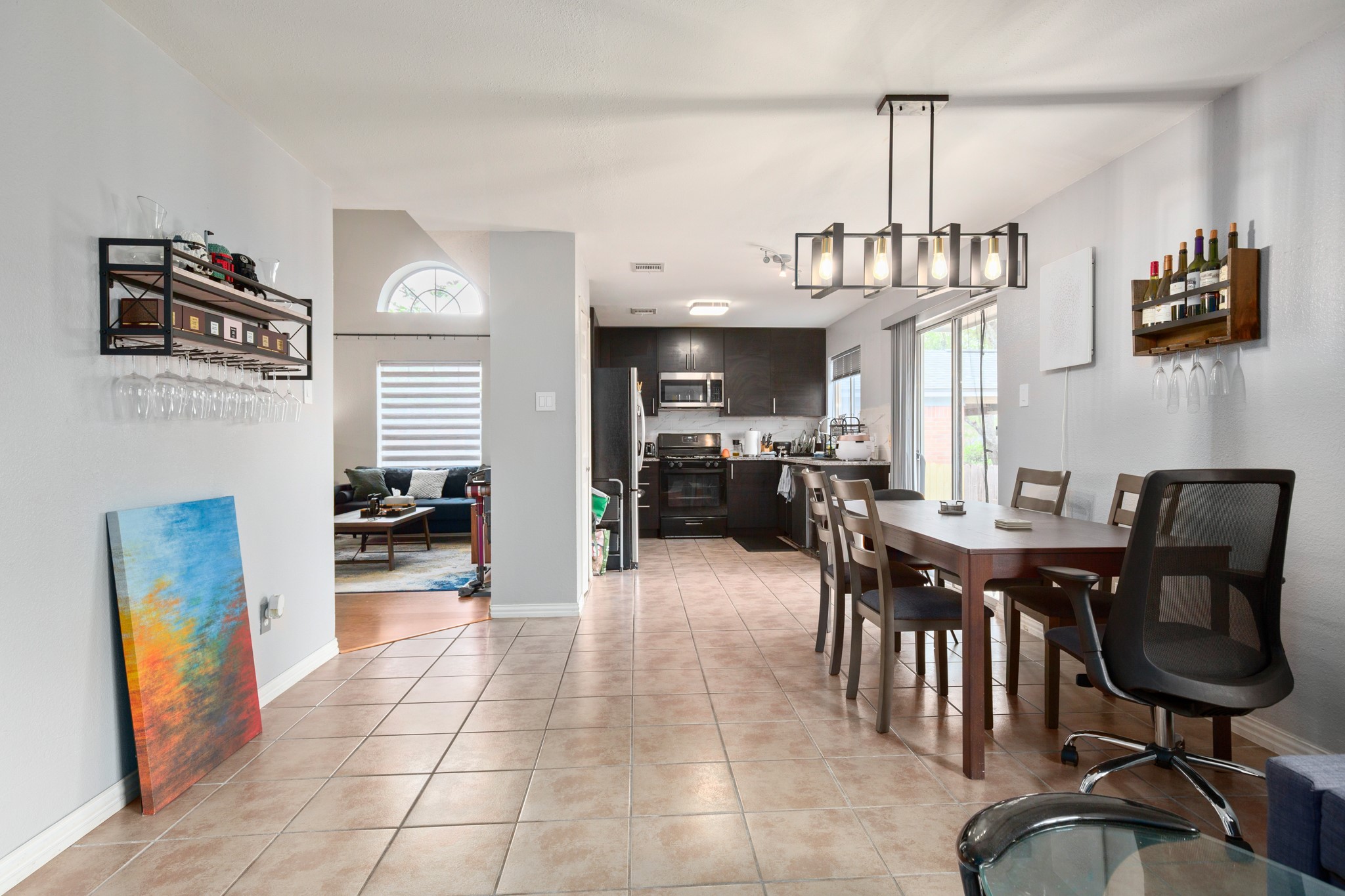 13803 Randalstone Drive Pflugerville, TX 78660 - Photo 18 of 27 Dining space featuring plenty of natural light and light tile patterned floors