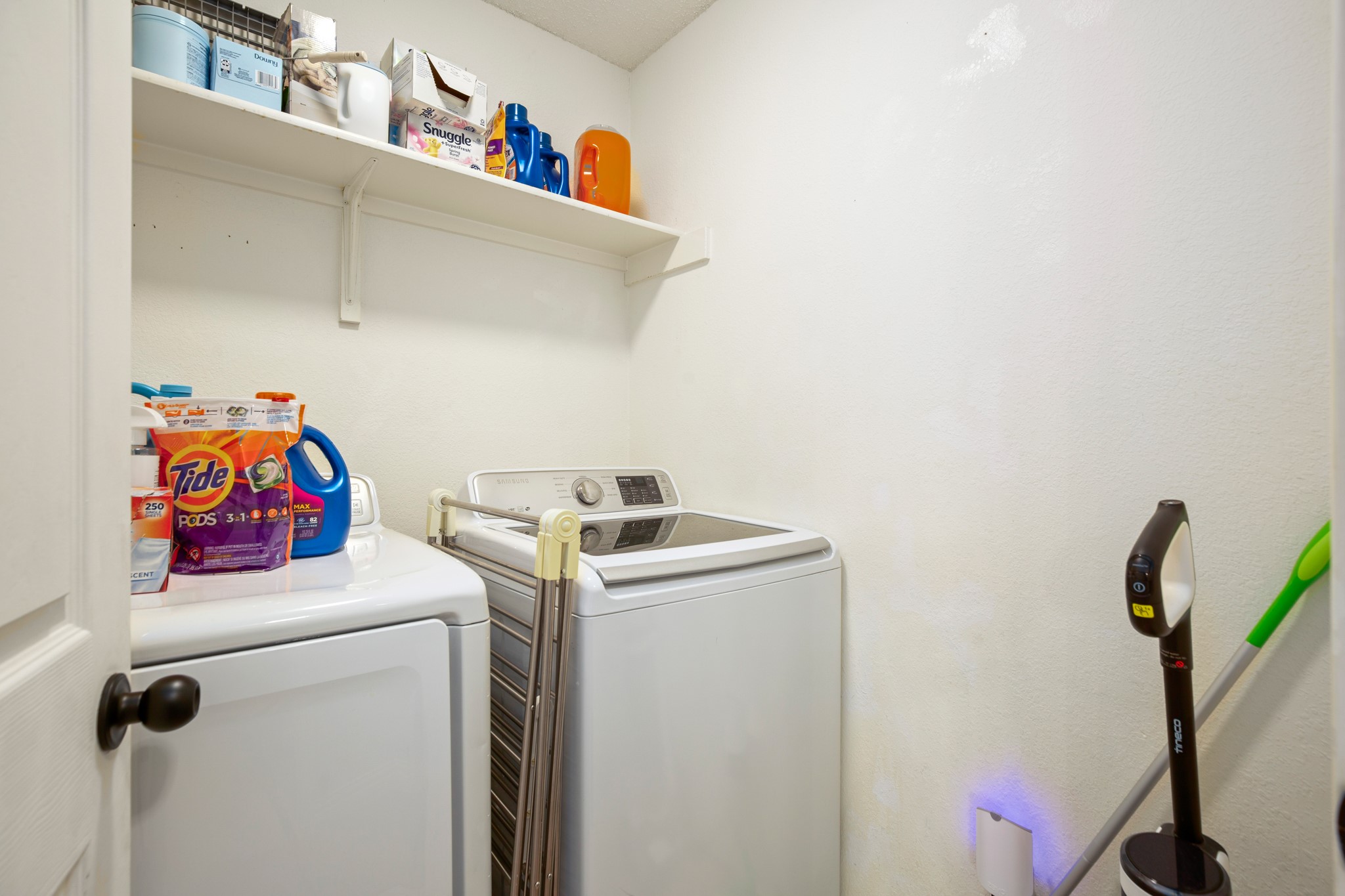 13803 Randalstone Drive Pflugerville, TX 78660 - Photo 10 of 27 Laundry room with washer and dryer